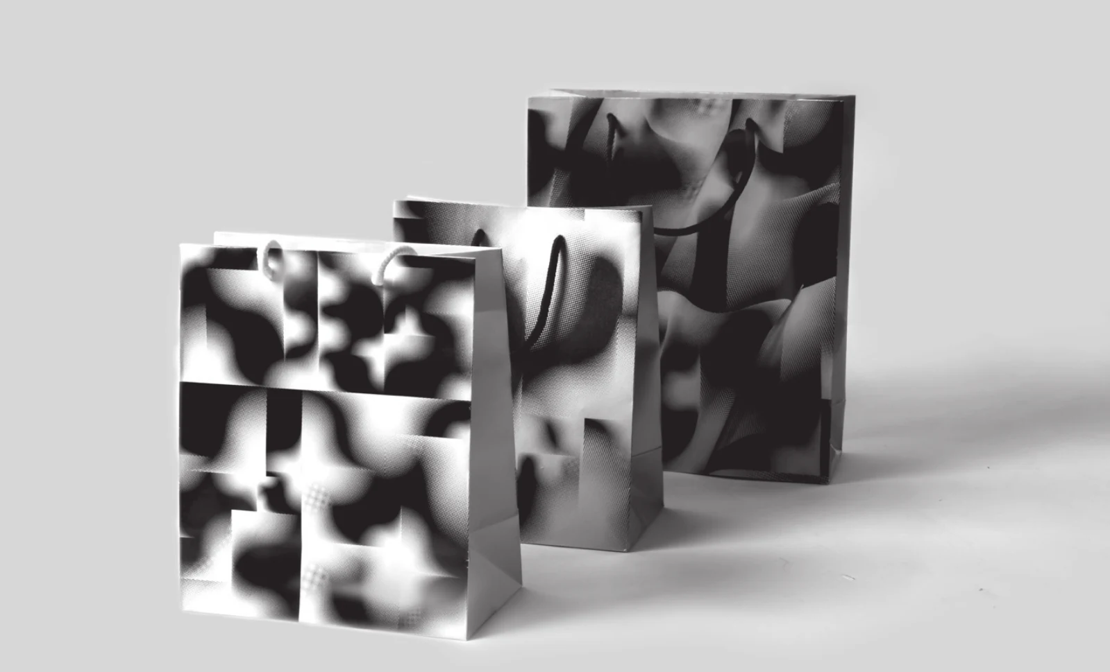 Folded festival publications showing the split-square pattern