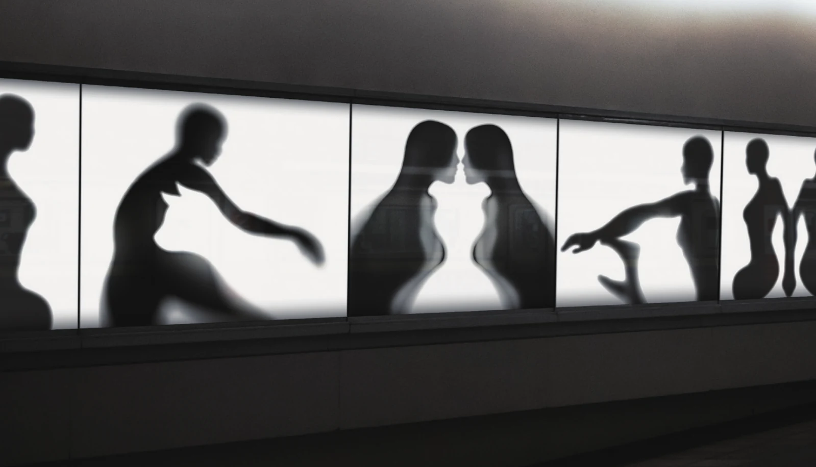 Figure–ground silhouettes across illuminated panels