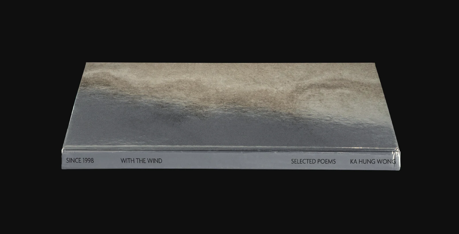 With the Wind lying flat, showing its cover and spine against the black background